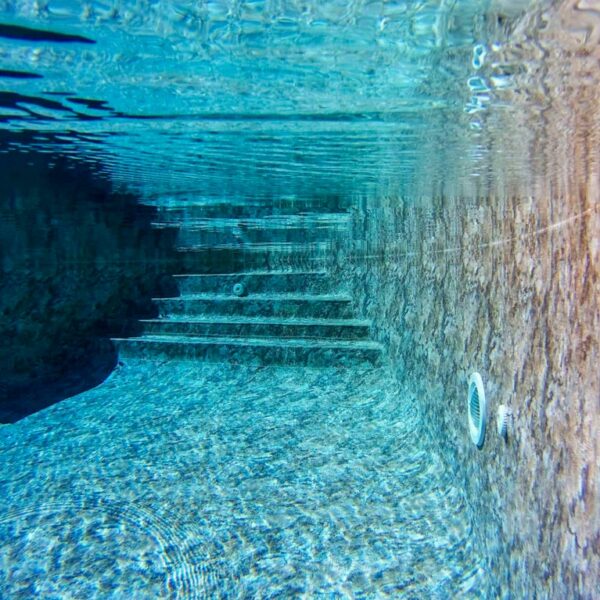 Piscine béton membrane armée 150/100°